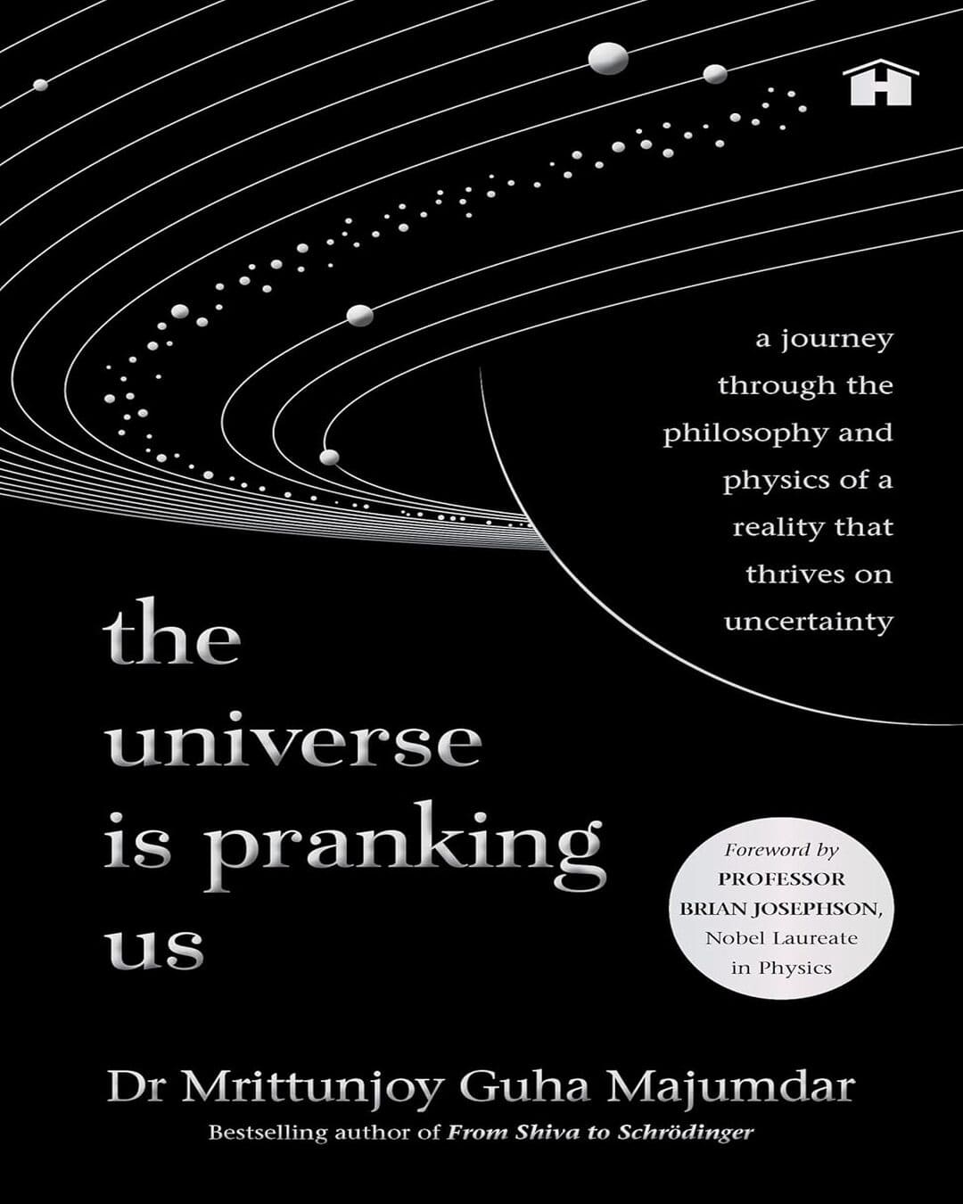 The Universe Is Pranking Us: A Journey Through The Philosophy And Physics Of A Reality That Thrives by Dr Mrittunjoy Guha Majumdar [Paperback]