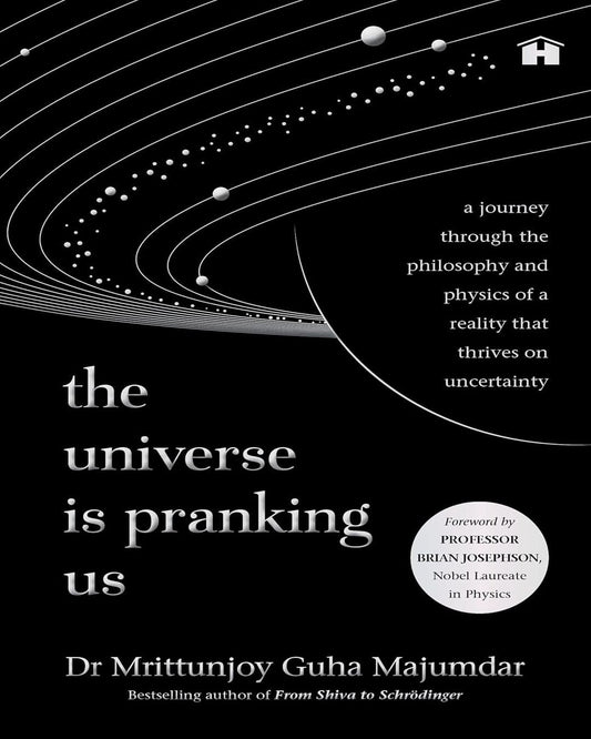 The Universe Is Pranking Us: A Journey Through The Philosophy And Physics Of A Reality That Thrives by Dr Mrittunjoy Guha Majumdar [Paperback]